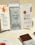 Magno chocolates packaging with a bar of chocolate on a light background