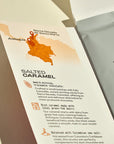 Product label for Sierra Nevada de Santa Marta salted caramel chocolate with map and text details.
