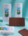 Chocolate bar with 'Cookie Chunks' packaging on a teal background