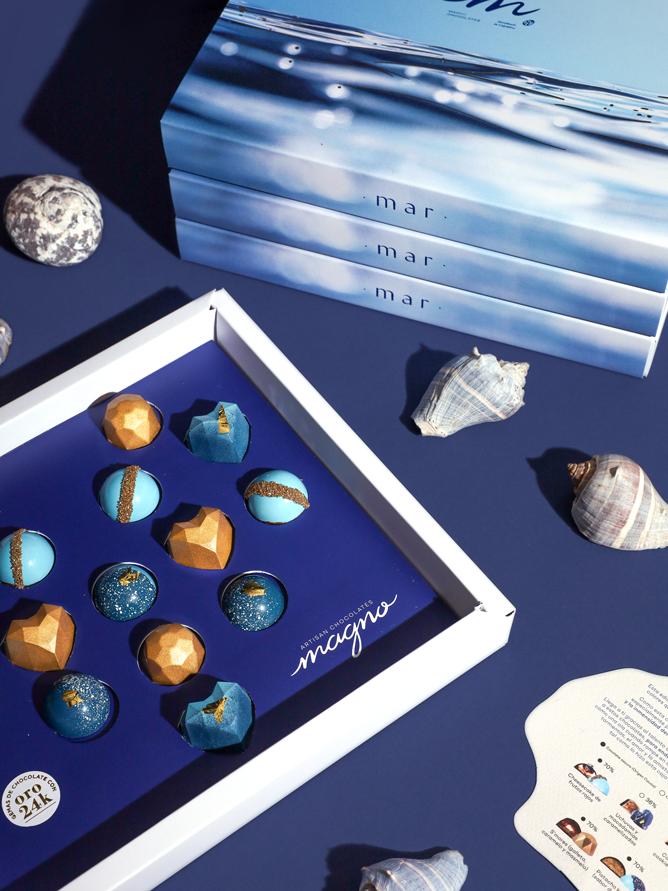Close up of Premium Chocolate Bonbons decorated with gold leaf
