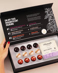 Colombian Coffee & Chocolate Tasting kit showing artisan chocolate bonbons and coffee drips