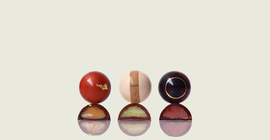 3 Magno Single Origin Bonbons cut open to show their fillings that were made from scratch